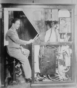 Anatol josepho in his photo booth black amd white picture from the 1920's