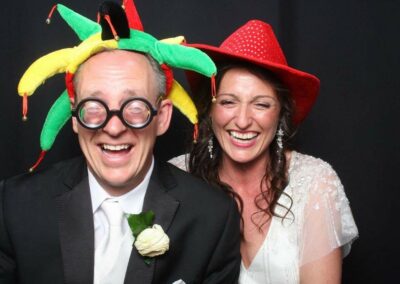 Guests giggling in the photo booth - Funbooth Photo Booth Hire